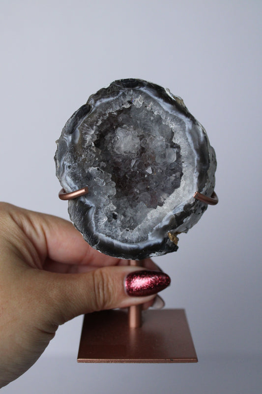 Agate geode on stand