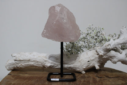 Rose quartz rough on stand