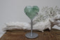 Green fluorite heart on stand