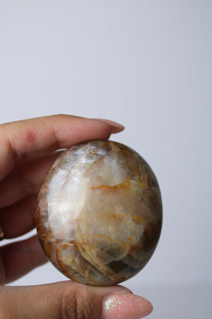 Pink moonstone palm stone